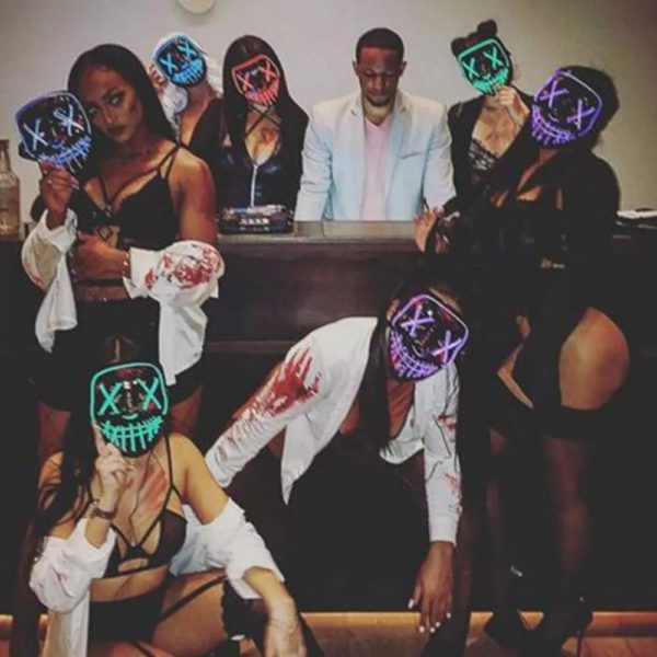 peoples wearing led mask for halloween