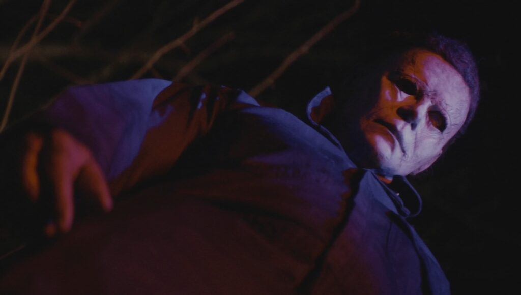 michael myers illuminated by police flashing lights
