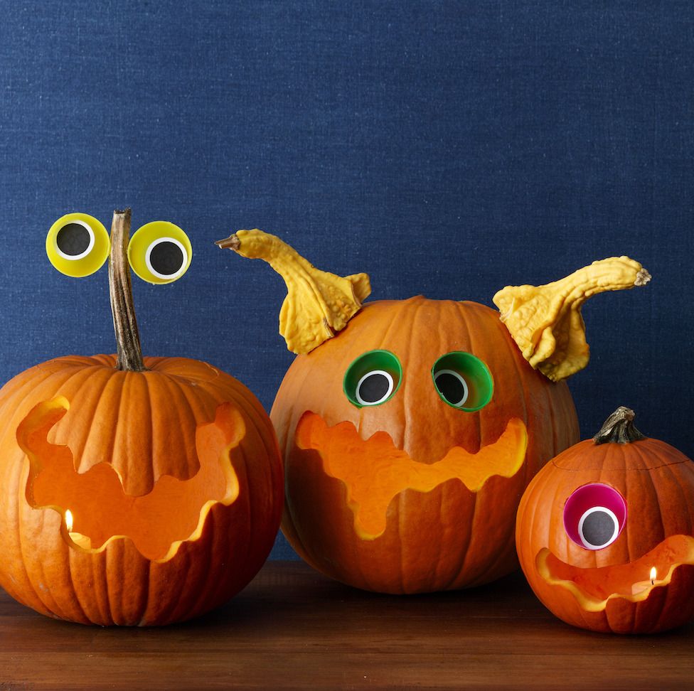three carved pumpkins